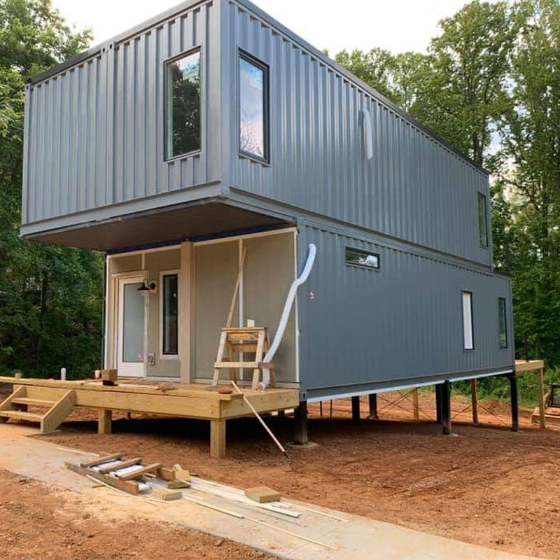 Stacked vertically container houses