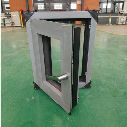 Ventana abatible de aluminio con rotura de puente térmico y doble acristalamiento de bajo consumo 